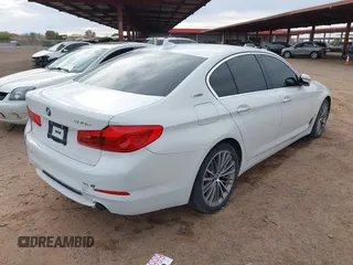 2018 BMW 5 Series 530e xDrive with VIN WBAJB1C55JB374652, listed as a IAAI auction lot 41812287 with 84,593 mi miles and . Bid and sale history available at carsss.com. Image 4.