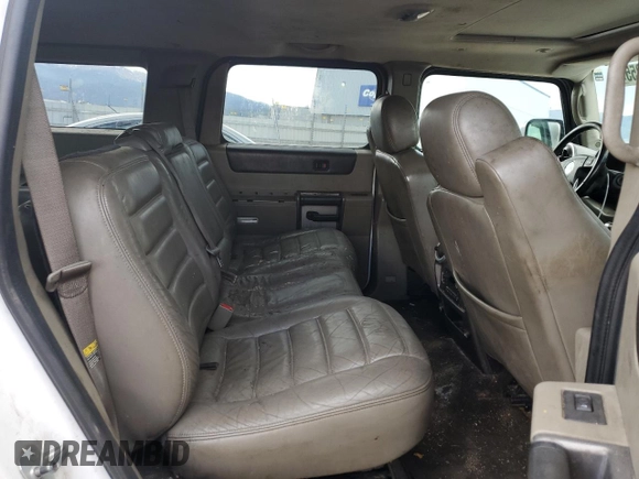 2004 Hummer H2 z VIN 5GRGN23U94H109105, wystawiony jako Copart lot #60548255 z przebiegiem 218 770 mil mil oraz Czysty tytuł • Clean title. Historia ofert i sprzedaży dostępna na DreamBid. Obrazek 10.