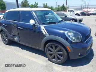 2013 MINI Countryman S with VIN WMWZC3C58DWP21061, listed as a IAAI auction lot 42707537 with 122,597 mi miles and . Bid and sale history available at DreamBid. Image 1.