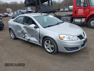 2009 Pontiac G6 GT 1SB z VIN 1G2ZK57K394255077, wystawiony jako IAAI lot #42073581 z przebiegiem 151 488 mil mil oraz . Historia ofert i sprzedaży dostępna na DreamBid. Obrazek 1.