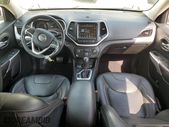 2018 Jeep Cherokee Trailhawk with VIN 1C4PJMBX0JD610455, listed as a Copart auction lot 61251565 with 75,818 mi miles and Salvage title. Bid and sale history available at DreamBid. Image 8.