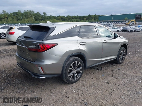 2018 Lexus RX 350L Premium z VIN JTJDZKCA2J2005016, wystawiony jako IAAI lot #40415146 z przebiegiem 33 212 mil mil oraz . Historia ofert i sprzedaży dostępna na DreamBid. Obrazek 4.