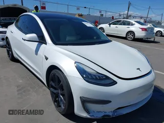 2019 Tesla Model 3 Mid Range with VIN 5YJ3E1EA5KF327181, listed as a IAAI auction lot 41860943 with 157,335 mi miles and . Bid and sale history available at DreamBid. Image 6.