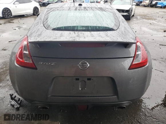 2016 Nissan 370Z Sport с VIN JN1AZ4EH3GM936250, выставлен на аукционе Copart как лот 44227205 с пробегом Не указан миль и Списание • Salvage title. История ставок и продаж доступна на DreamBid. Изображение 6.