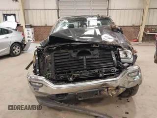2017 GMC Sierra 1500 SLE z VIN 1GTV2MEC2HZ194077, wystawiony jako IAAI lot #41509400 z przebiegiem Nie podano mil oraz . Historia ofert i sprzedaży dostępna na DreamBid. Obrazek 6.