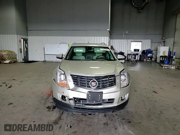 2014 Cadillac SRX Premium Collection с VIN 3GYFNDE3XES611363, выставлен на аукционе Copart как лот 50643475 с пробегом 57 749 миль миль и Списание • Salvage title. История ставок и продаж доступна на DreamBid. Изображение 12.