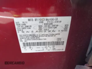 2013 Ford Explorer XLT z VIN 1FM5K7D8XDGB21765, wystawiony jako IAAI lot #42596215 z przebiegiem Nie podano mil oraz . Historia ofert i sprzedaży dostępna na DreamBid. Obrazek 9.