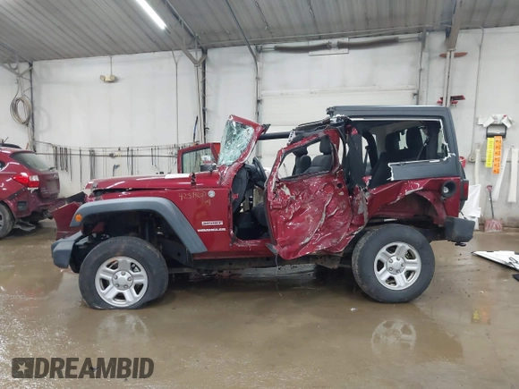2011 Jeep Wrangler Sport z VIN 1J4AA2D19BL613164, wystawiony jako IAAI lot #42514207 z przebiegiem Nie podano mil oraz . Historia ofert i sprzedaży dostępna na DreamBid. Obrazek 13.