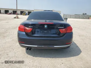 2015 BMW 4 Series 428i xDrive with VIN WBA3T1C55FP820640, listed as a Copart auction lot 60394605 with 111,288 mi miles and Salvage title. Bid and sale history available at DreamBid. Image 6.