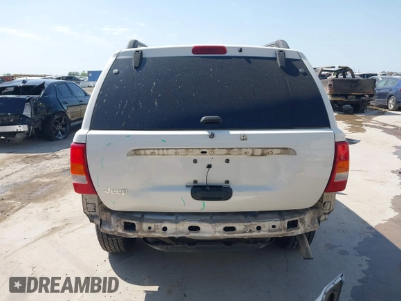 2003 Jeep Grand Cherokee Laredo with VIN 1J4GX48S43C518584, listed as a IAAI auction lot 42213094 with 163,743 mi miles and . Bid and sale history available at DreamBid. Image 17.