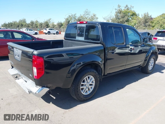 2016 Nissan Frontier SV with VIN 1N6AD0ER5GN794455, listed as a IAAI auction lot 42520541 with 67,377 mi miles and . Bid and sale history available at DreamBid. Image 4.