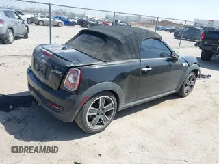 2012 MINI Roadster S with VIN WMWSY3C56CT144520, listed as a IAAI auction lot 41818205 with 86,836 mi miles and . Bid and sale history available at DreamBid. Image 4.