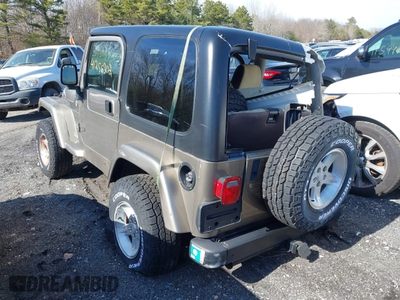 2004 Jeep Wrangler Sahara with VIN 1J4FA59S14P772264, listed as a IAAI auction lot 41814074 with 165,750 mi miles and . Bid and sale history available at DreamBid. Image 3.