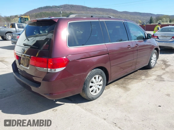 2009 Honda Odyssey EX-L with VIN 5FNRL38619B040594, listed as a IAAI auction lot 42037189 with 189,677 mi miles. Bid and sale history available at carsss.com. Image 4.