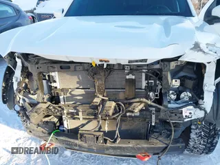 2024 Nissan Frontier Pro-4X with VIN 1N6ED1EK3RN620414, listed as a IAAI auction lot 41613820 with 10,714 mi miles and . Bid and sale history available at DreamBid. Image 6.