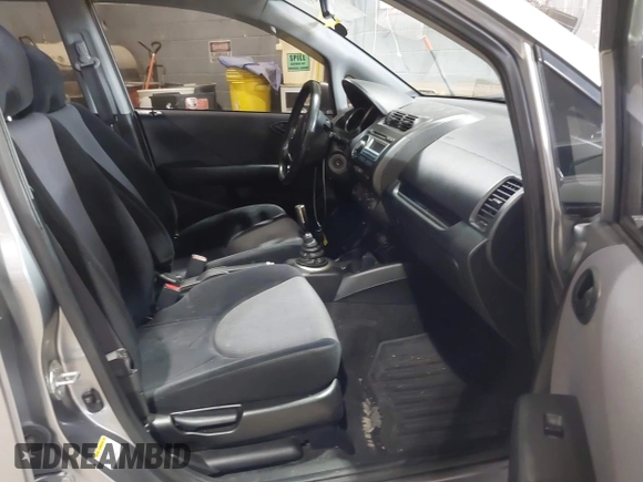 2007 Honda Fit Sport with VIN JHMGD37637S052380, listed as a IAAI auction lot 41219293 with 171,586 mi miles. Bid and sale history available at carsss.com. Image 5.