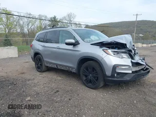 2021 Honda Pilot Special Edition z VIN 5FNYF6H20MB061334, wystawiony jako IAAI lot #42123022 z przebiegiem 92 183 mil mil oraz . Historia ofert i sprzedaży dostępna na DreamBid. Obrazek 1.