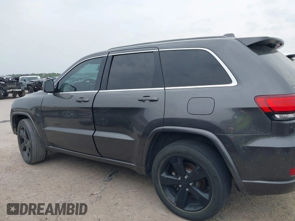 2015 Jeep Grand Cherokee Altitude with VIN 1C4RJEAG3FC219782, listed as a IAAI auction lot 42076212 with 194,910 mi miles. Bid and sale history available at carsss.com. Image 14.