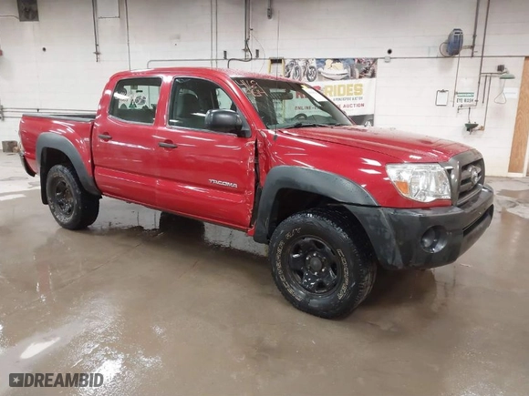 2009 Toyota Tacoma with VIN 3TMLU42N99M035163, listed as a IAAI auction lot 41694514 with 233,327 mi miles. Bid and sale history available at carsss.com. Image 1.