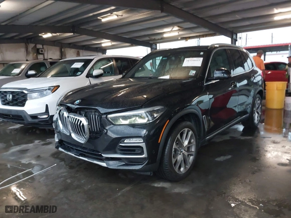 2019 BMW X5 xDrive40i with VIN 5UXCR6C59KLL12458, listed as a IAAI auction lot 41910665 with 80,287 mi miles. Bid and sale history available at carsss.com. Image 17.