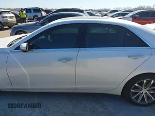 2016 Cadillac CTS with VIN 1G6AR5SS1G0112728, listed as a IAAI auction lot 41830547 with 100,610 mi miles and . Bid and sale history available at DreamBid. Image 14.