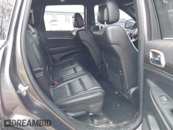 2014 Jeep Grand Cherokee Limited with VIN 1C4RJFBG3EC534827, listed as a IAAI auction lot 41907916 with 138,811 mi miles and . Bid and sale history available at DreamBid. Image 8.