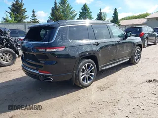 2021 Jeep Grand Cherokee Overland z VIN 1C4RJKDG9M8119728, wystawiony jako IAAI lot #42324696 z przebiegiem 48 379 mil mil oraz . Historia ofert i sprzedaży dostępna na DreamBid. Obrazek 4.
