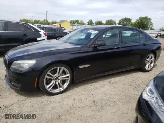 2012 BMW 7 Series 740Li with VIN WBAKB4C5XCC576227, listed as a Copart auction lot 52946135 with 154,611 mi miles and Salvage Title. Bid and sale history available at carsss.com. Image 1.