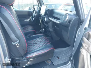 2015 Jeep Wrangler Unlimited Rubicon Hard Rock with VIN 1C4HJWFG1FL777222, listed as a IAAI auction lot 41843893 with 74,718 mi miles. Bid and sale history available at carsss.com. Image 5.
