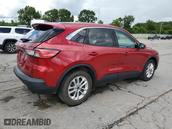 2021 Ford Escape SE with VIN 1FMCU0G67MUA28996, listed as a Copart auction lot 60305015 with 64,013 mi miles and Salvage title. Bid and sale history available at DreamBid. Image 3.