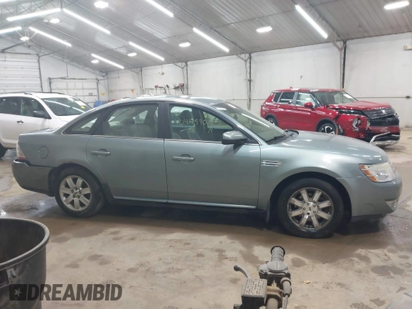 2008 Ford Taurus SEL with VIN 1FAHP24W18G159322, listed as a IAAI auction lot 42144590 with 163,397 mi miles and . Bid and sale history available at DreamBid. Image 13.