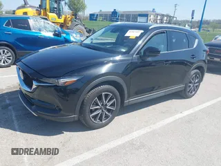 2018 Mazda CX-5 Grand Touring with VIN JM3KFADM2J1324547, listed as a IAAI auction lot 41947497 with 66,254 mi miles. Bid and sale history available at carsss.com. Image 20.