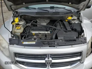 2010 Dodge Caliber SXT z VIN 1B3CB4HAXAD605621, wystawiony jako Copart lot #59040275 z przebiegiem 191 401 mil mil oraz Szkoda całkowita • Salvage title. Historia ofert i sprzedaży dostępna na DreamBid. Obrazek 12.