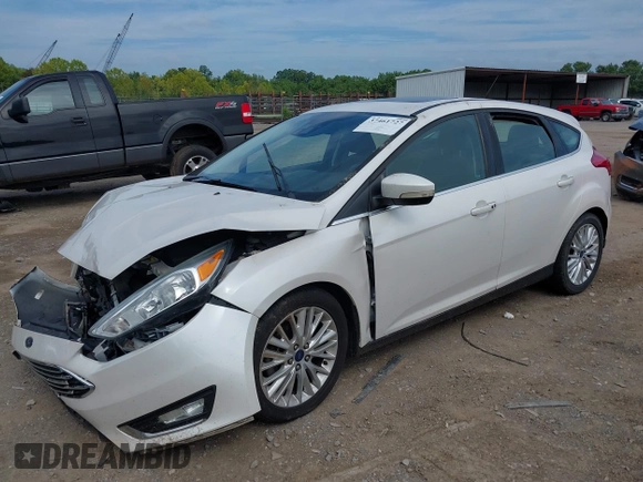 2015 Ford Focus Titanium with VIN 1FADP3N22FL365477, listed as a IAAI auction lot 37461727 with Not provided miles and . Bid and sale history available at DreamBid. Image 2.