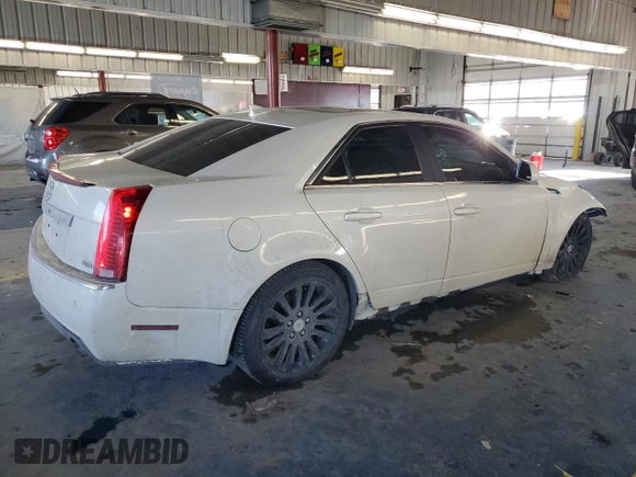 2012 Cadillac CTS Premium with VIN 1G6DS5E39C0150157, listed as a Copart auction lot 87795735 with 127,225 mi miles and Salvage Title. Bid and sale history available at DreamBid. Image 3.
