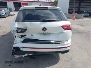 2024 Volkswagen Tiguan SE R-Line Black with VIN 3VVCB7AX6RM093792, listed as a IAAI auction lot 42117670 with 15,379 mi miles and . Bid and sale history available at DreamBid. Image 6.