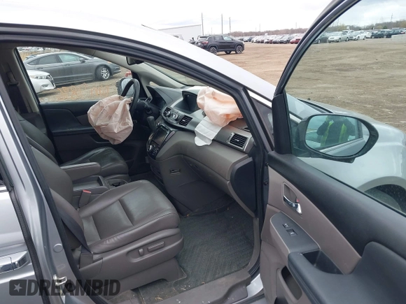 2016 Honda Odyssey Touring Elite with VIN 5FNRL5H99GB107896, listed as a IAAI auction lot 42040395 with 162,120 mi miles and . Bid and sale history available at carsss.com. Image 5.