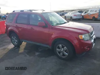 2012 Ford Escape Limited with VIN 1FMCU9EG2CKC34608, listed as a IAAI auction lot 40985269 with 151,613 mi miles. Bid and sale history available at carsss.com. Image 1.