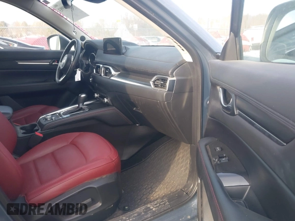 2021 Mazda CX-5 Touring z VIN JM3KFBCMXM0463469, wystawiony jako IAAI lot #41488993 z przebiegiem 28 582 mil mil oraz . Historia ofert i sprzedaży dostępna na DreamBid. Obrazek 5.