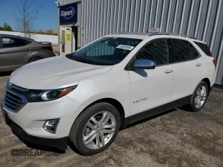 2020 Chevrolet Equinox Premier z VIN 3GNAXYEX1LS722067, wystawiony jako Copart lot #55828395 z przebiegiem 69 728 mil mil oraz Szkoda całkowita • Salvage title. Historia ofert i sprzedaży dostępna na DreamBid. Obrazek 1.