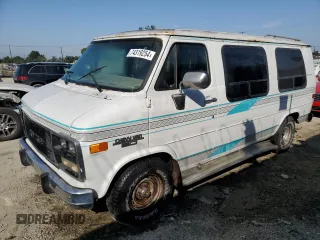 1994 Chevrolet Chevy Van z VIN 1GBEG25K1RF118547, wystawiony jako Copart lot #74319254 z przebiegiem 179 866 mil mil oraz Tytuł czysty. Historia ofert i sprzedaży dostępna na DreamBid. Obrazek 1.