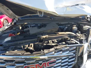 2018 GMC Yukon XL Denali with VIN 1GKS2HKJ2JR183877, listed as a IAAI auction lot 41652039 with 123,075 mi miles. Bid and sale history available at carsss.com. Image 10.