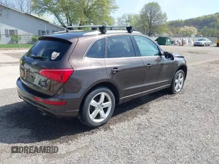 2012 Audi Q5 2.0T Premium Plus with VIN WA1LFAFP5CA024857, listed as a IAAI auction lot 42016833 with 141,144 mi miles. Bid and sale history available at carsss.com. Image 4.