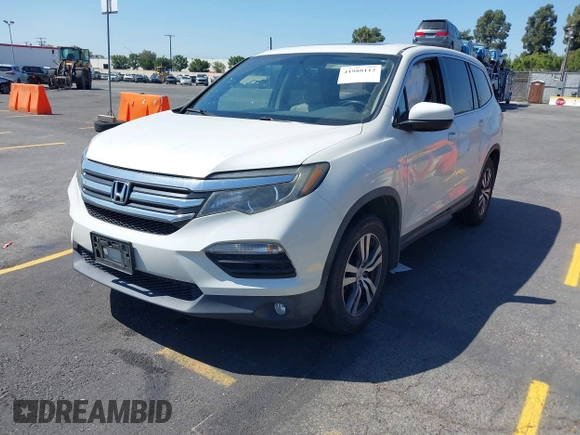 2016 Honda Pilot EX-L with VIN 5FNYF5H54GB037742, listed as a IAAI auction lot 41988112 with 68,459 mi miles and . Bid and sale history available at DreamBid. Image 17.