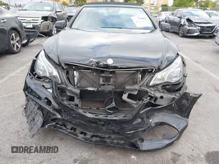 2016 Mercedes-Benz E with VIN WDDKK6FF7GF339417, listed as a IAAI auction lot 42111352 with 59,859 mi miles. Bid and sale history available at carsss.com. Image 12.