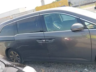 2014 Honda Odyssey Touring with VIN 5FNRL5H99EB111685, listed as a IAAI auction lot 42141227 with 183,484 mi miles and . Bid and sale history available at DreamBid. Image 13.