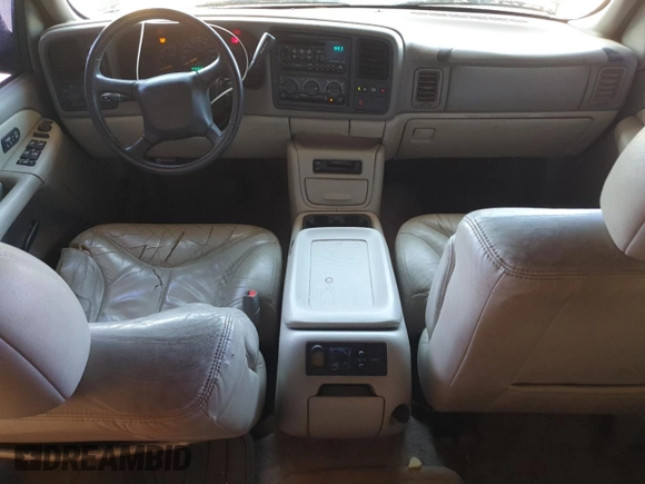 2001 GMC Yukon SLT z VIN 1GKEK13T21J165558, wystawiony jako Copart lot #52200565 z przebiegiem 291 699 mil mil oraz Szkoda całkowita • Salvage title. Historia ofert i sprzedaży dostępna na DreamBid. Obrazek 8.