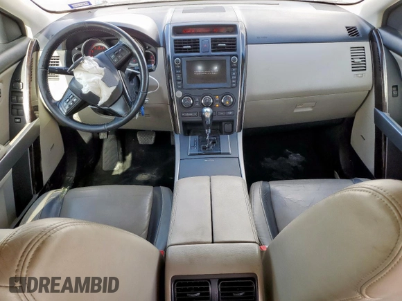 2010 Mazda CX-9 Grand Touring with VIN JM3TB2MA5A0238683, listed as a Copart auction lot 61385315 with 231,207 mi miles and Salvage title. Bid and sale history available at DreamBid. Image 8.