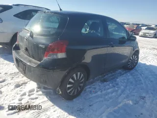 2011 Toyota Yaris with VIN JTDJT4K39B5336620, listed as a Copart auction lot 42252725 with 84,623 mi miles and Salvage Title. Bid and sale history available at carsss.com. Image 3.
