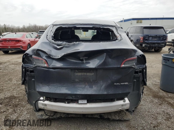 2024 Tesla Model Y Long Range with VIN 7SAYGAEE6RF070354, listed as a Copart auction lot 49826975 with Not Provided miles and Clean Title. Bid and sale history available at DreamBid. Image 6.